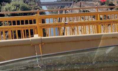 Γυναίκα απειλούσε να αυτοκτονήσει από τη γέφυρα του Ισθμού (photos)
